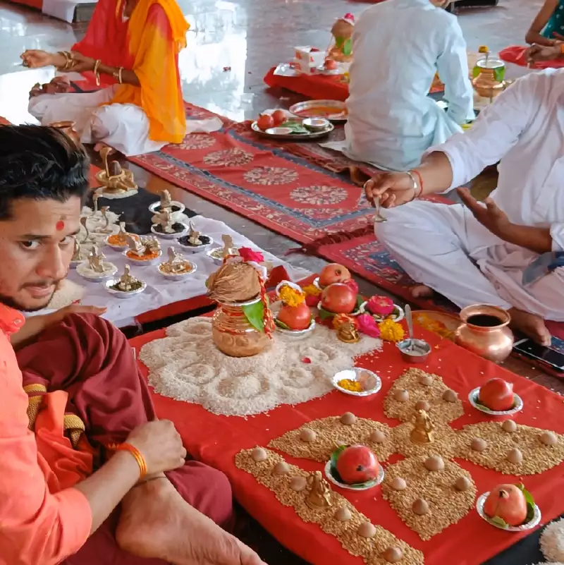 Pandit guiding an in-person Mangal Dosha Puja in Ujjain