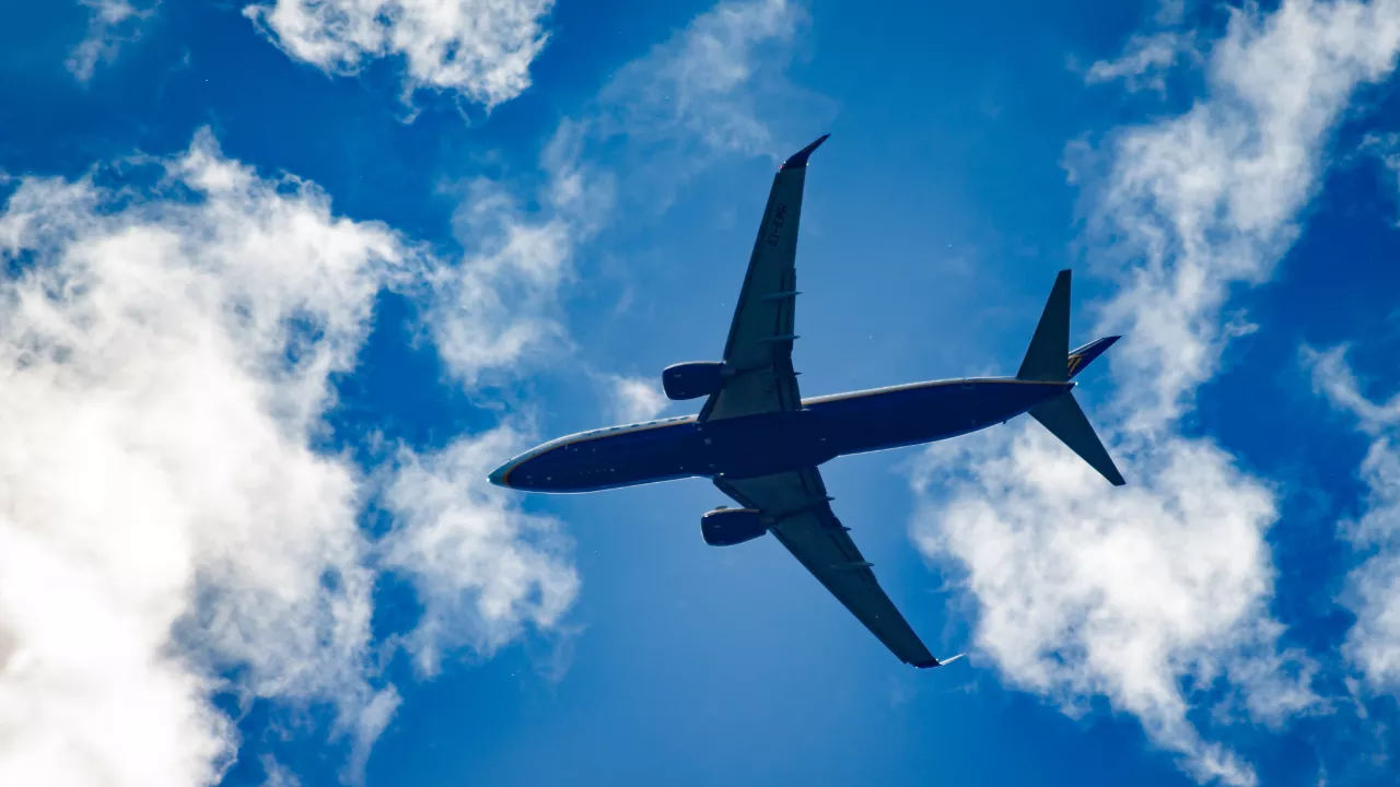Image of Flying Airplane- Prayagraj pilgrimage from Malaysia