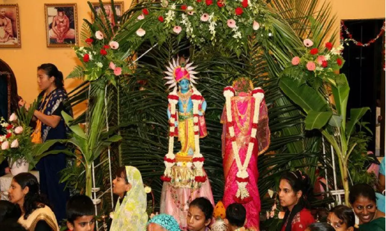 Kartik Poornima pooja with lamps and devotional offerings at the ghat