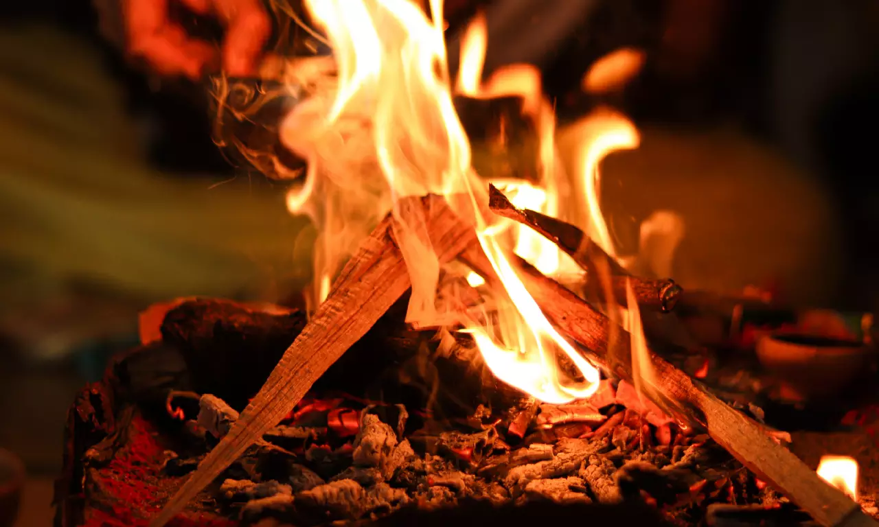 Sacred fire of devotion burning during Kartik Poornima puja on the ghats